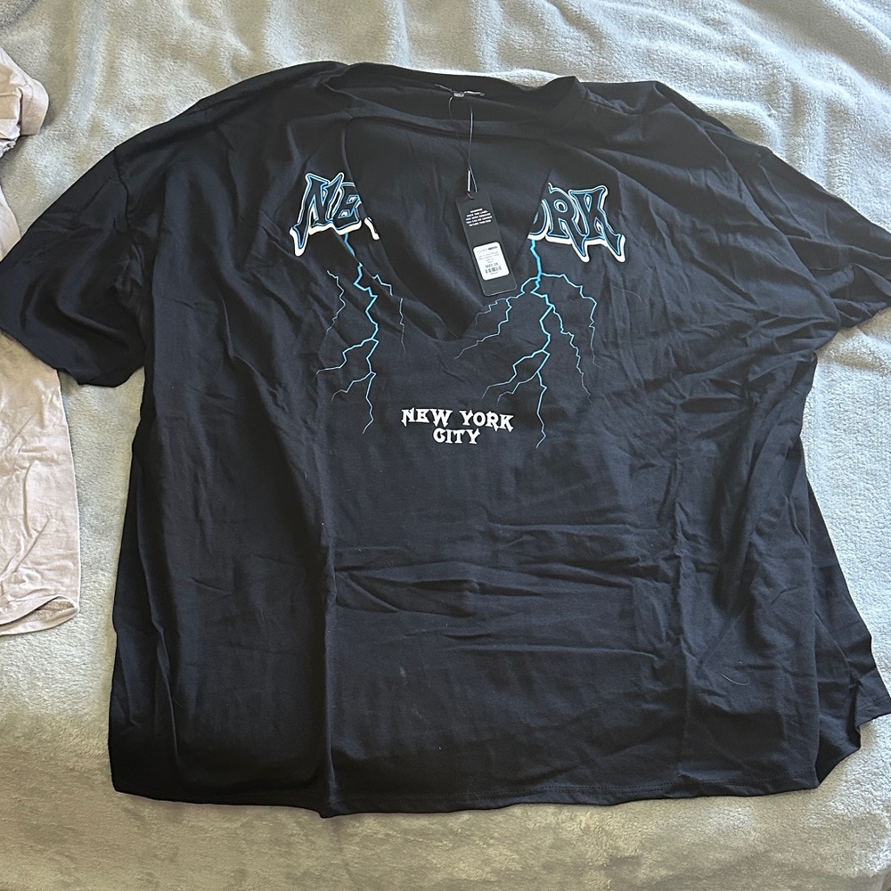 Fashion Nova Black Plunge Neck New York Graphic Tee with Blue Lightning